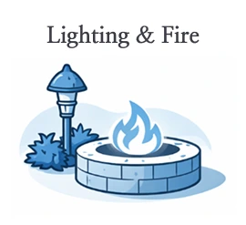 Outdoor fire pit with a flame next to a landscape lighting post.